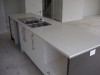 Island bench with sink installed.